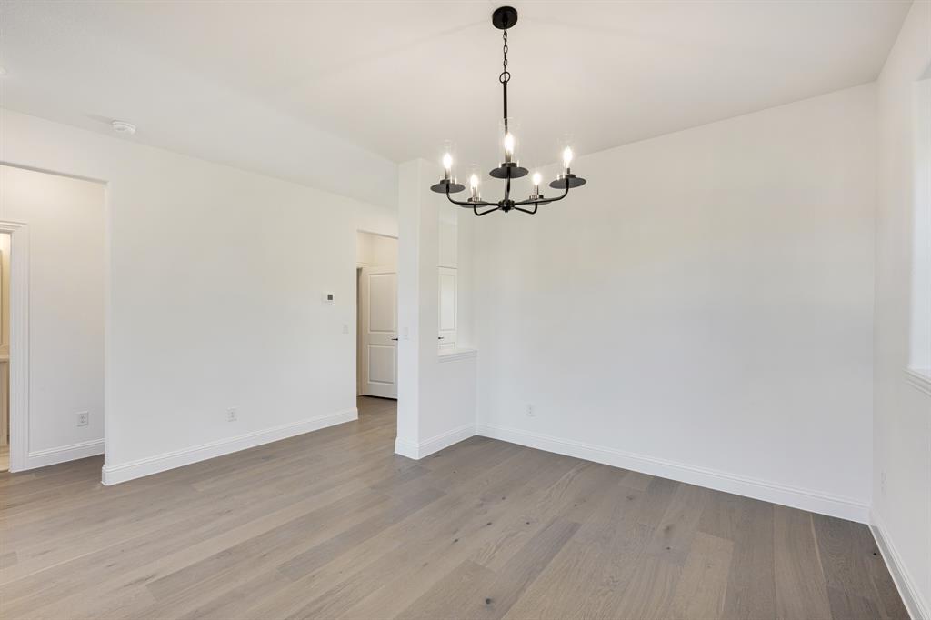 2401 Rileigh Lane Mansfield, TX 76063 - Photo 5 of 40 a view of a chandelier in a room