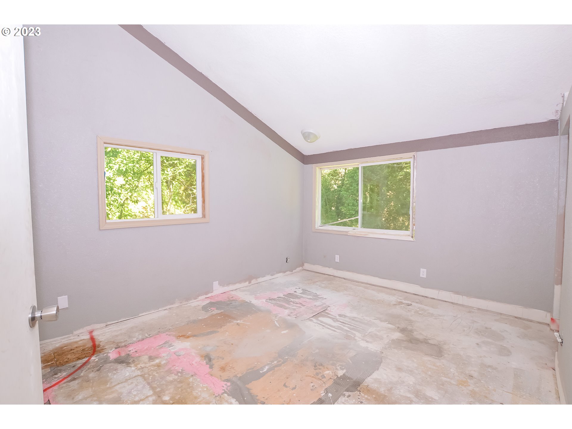 207 Snowberry Road Roseburg, OR 97471 - Photo 24 of 31 a view of an empty room with a window