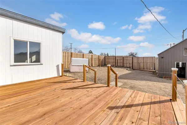 a view of a terrace with wooden floor