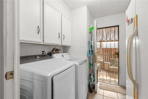 a bedroom with a bed and a table