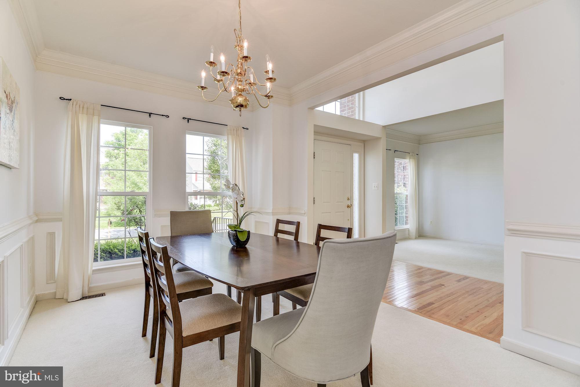 14629 Bubbling Spring Road Boyds, MD 20841 - Photo 13 of 30 a view of a dining room with furniture and window