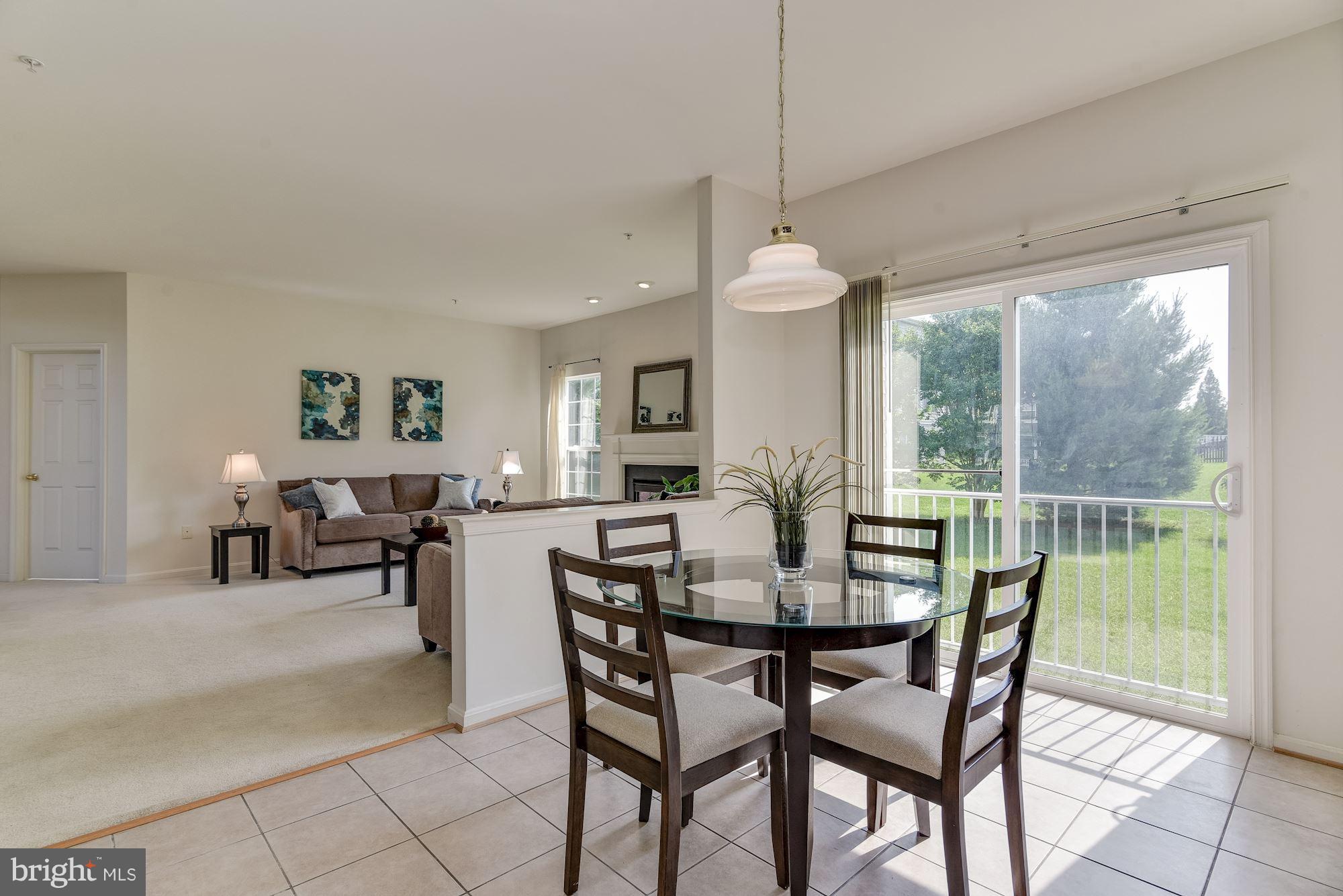 14629 Bubbling Spring Road Boyds, MD 20841 - Photo 14 of 30 a view of a dining room with furniture window and outside view
