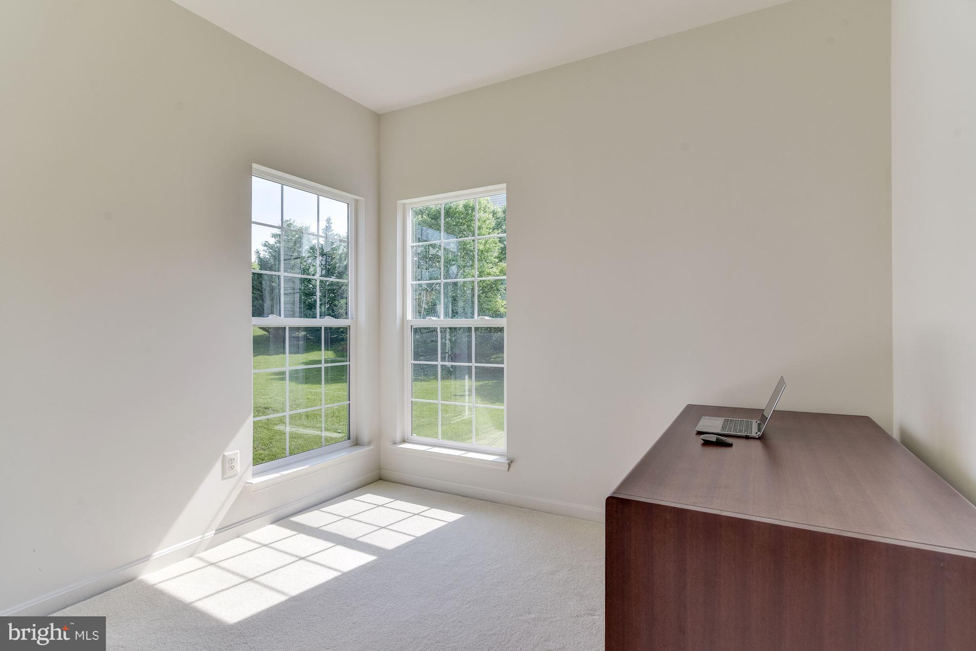 14629 Bubbling Spring Road Boyds, MD 20841 - Photo 17 of 30 a view of an empty room with a window