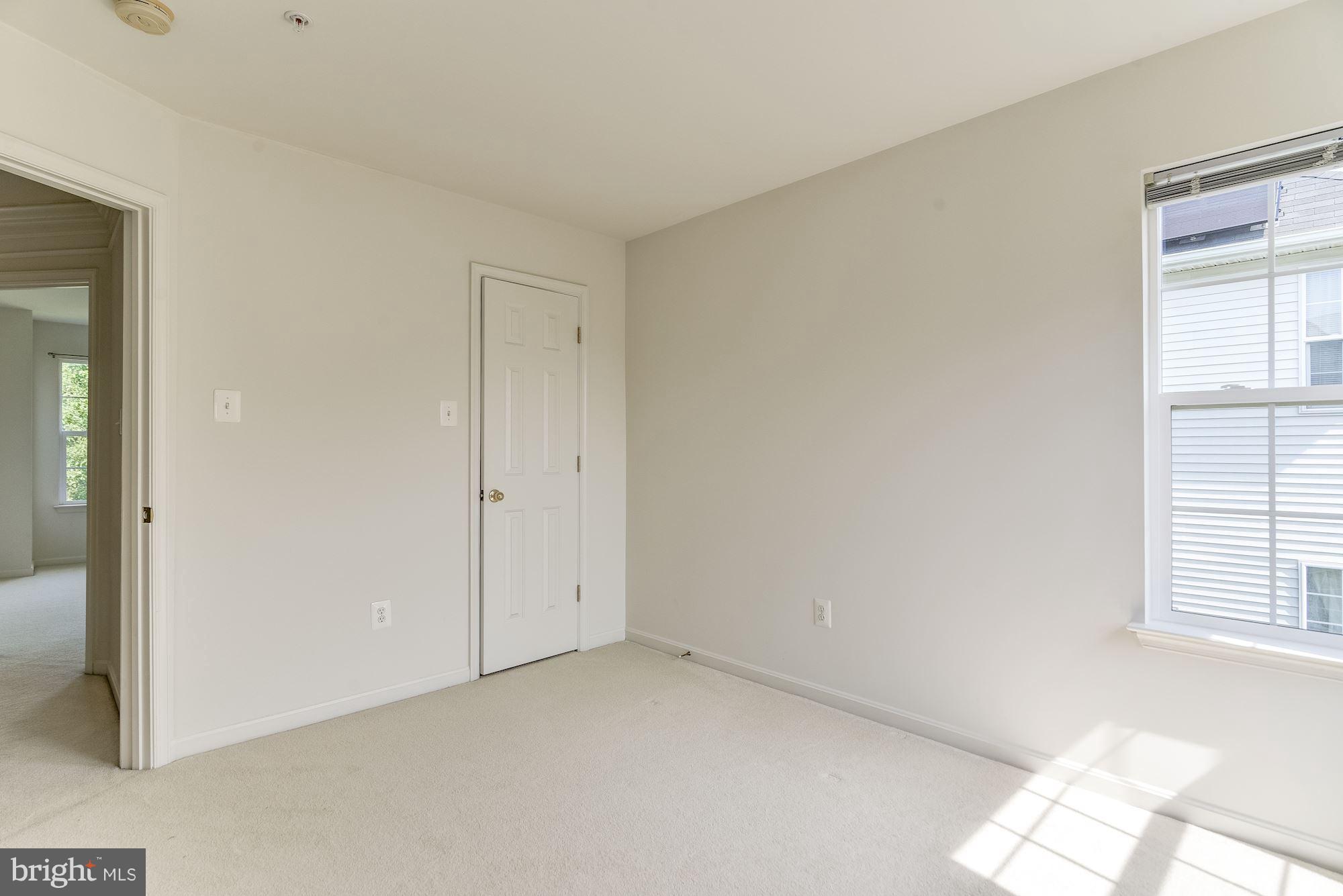 14629 Bubbling Spring Road Boyds, MD 20841 - Photo 23 of 30 an empty room with windows