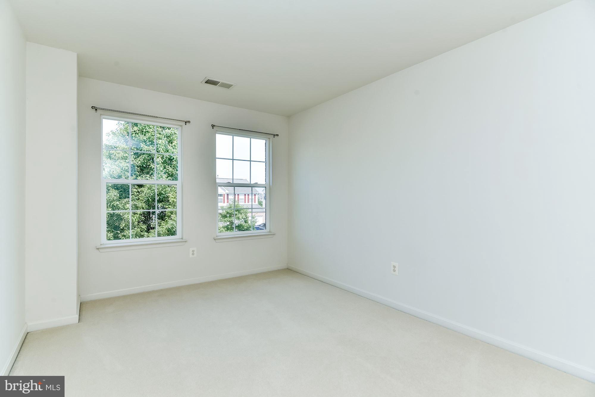 14629 Bubbling Spring Road Boyds, MD 20841 - Photo 24 of 30 an empty room with windows