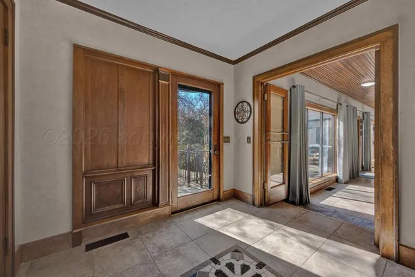 an empty room with windows