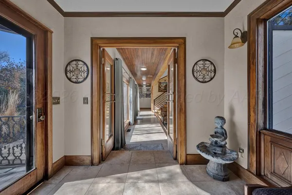 a view of a hallway with elevator