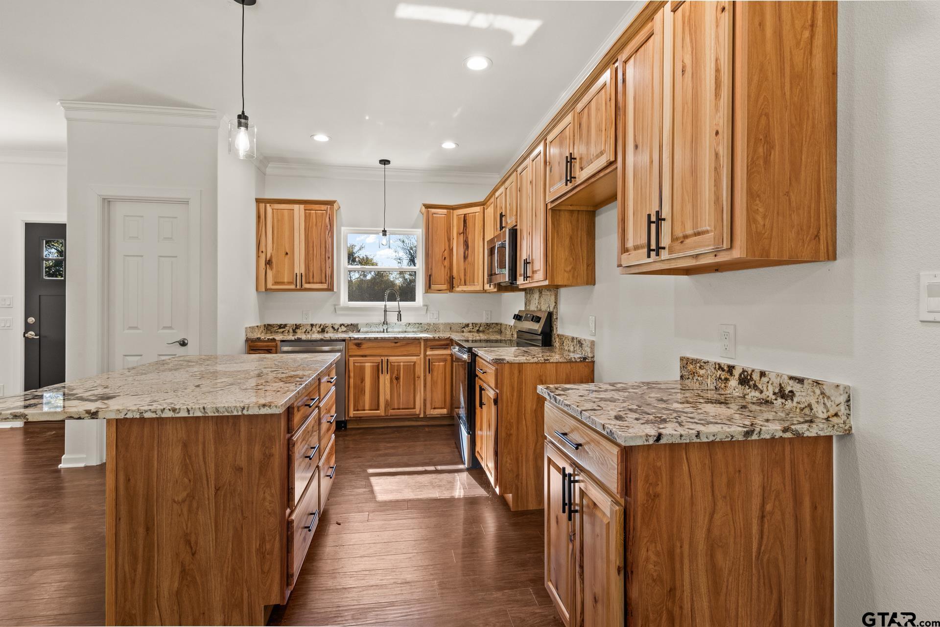 1339 Hwy 67 Mount Mount Vernon, TX 75457 - Photo 15 of 47 a kitchen with stainless steel appliances granite countertop a sink stove and cabinets