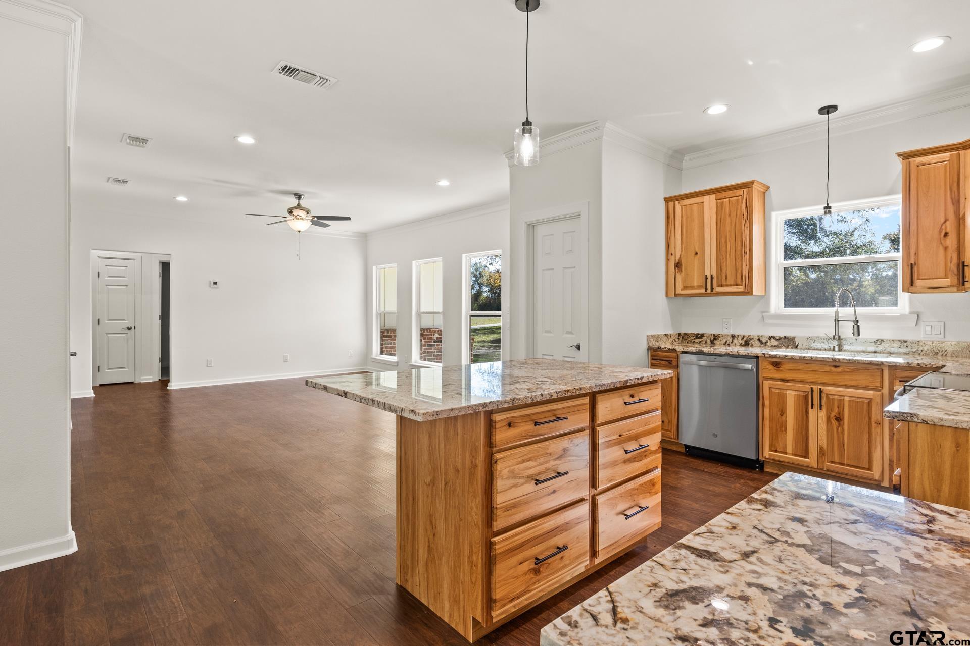 1339 Hwy 67 Mount Mount Vernon, TX 75457 - Photo 19 of 47 a large kitchen with kitchen island a sink stainless steel appliances and cabinets