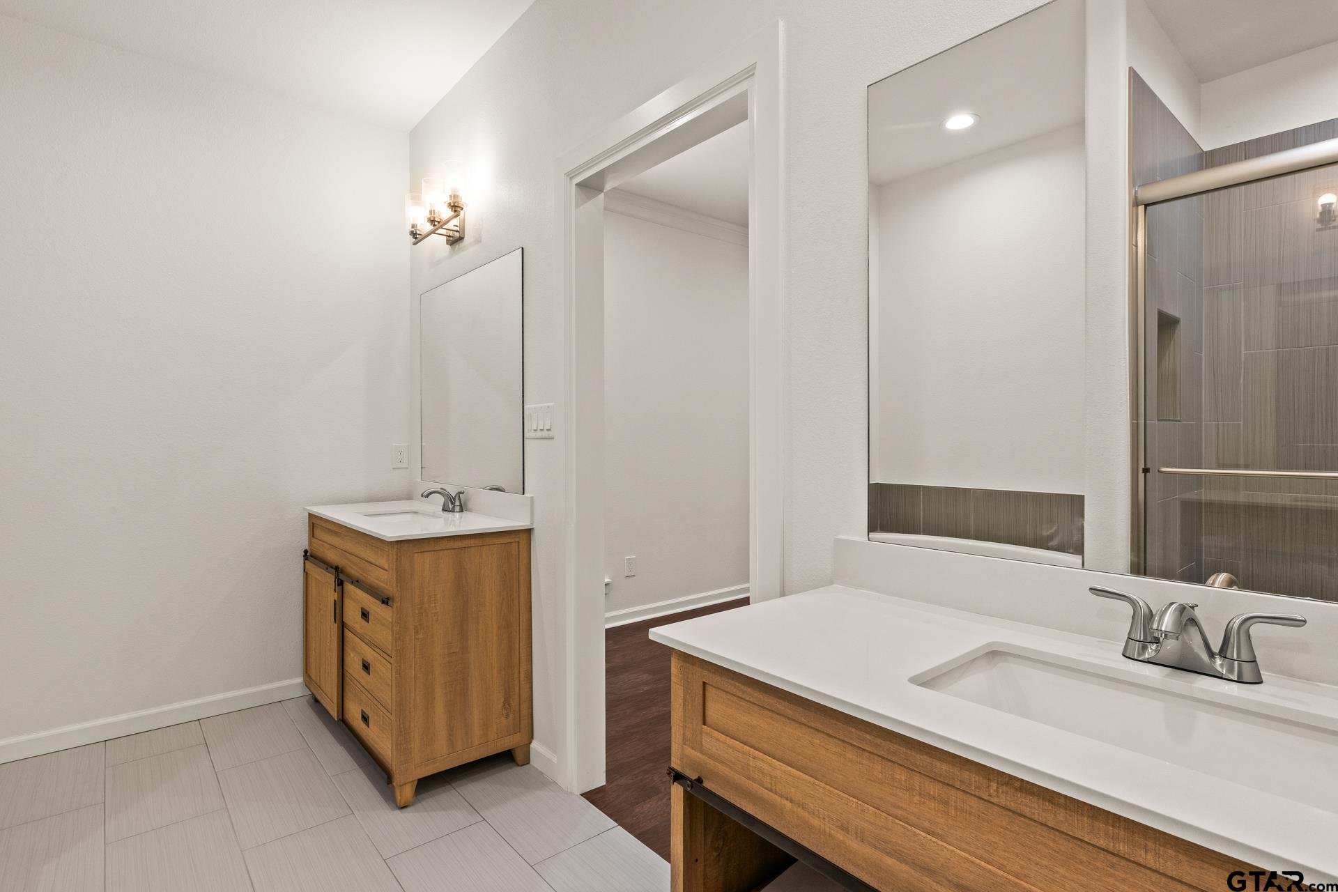 1339 Hwy 67 Mount Mount Vernon, TX 75457 - Photo 25 of 47 a bathroom with a sink and a mirror