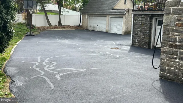 a view of a garage with an empty space
