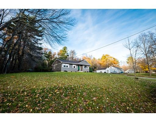 116 Stafford Road Holland, MA 01521 - Photo 3 of 24 a view of a big yard with a house