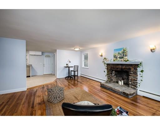 116 Stafford Road Holland, MA 01521 - Photo 4 of 24 a living room with furniture and a fireplace
