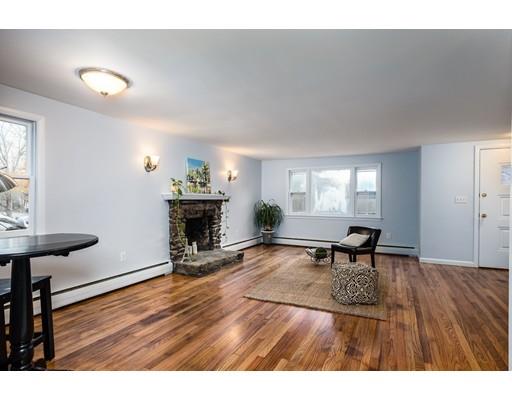 116 Stafford Road Holland, MA 01521 - Photo 5 of 24 a living room with furniture and a fireplace