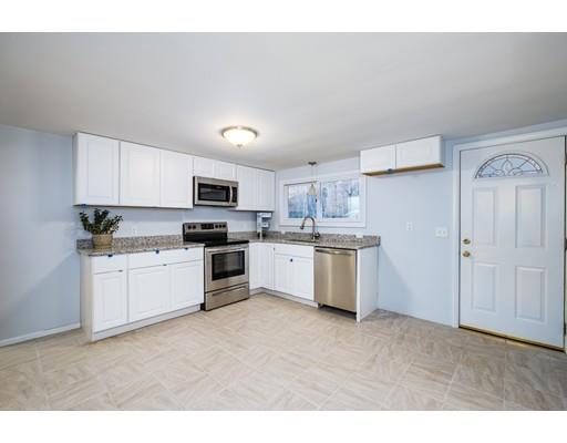 116 Stafford Road Holland, MA 01521 - Photo 6 of 24 a kitchen with a sink and white cabinets