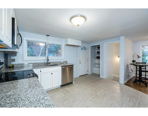 116 Stafford Road Holland, MA 01521 - Photo 8 of 24 a kitchen with a refrigerator and a sink