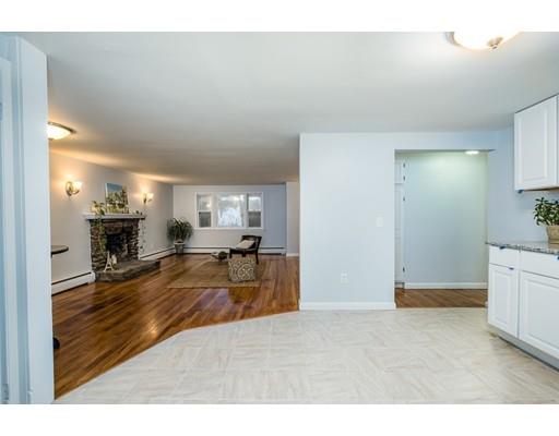 116 Stafford Road Holland, MA 01521 - Photo 10 of 24 a living room with furniture and a table