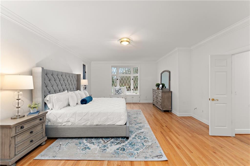 7 Meadowood Drive Pittsburgh, PA 15215 - Photo 15 of 45 a bedroom with a large bed and a window