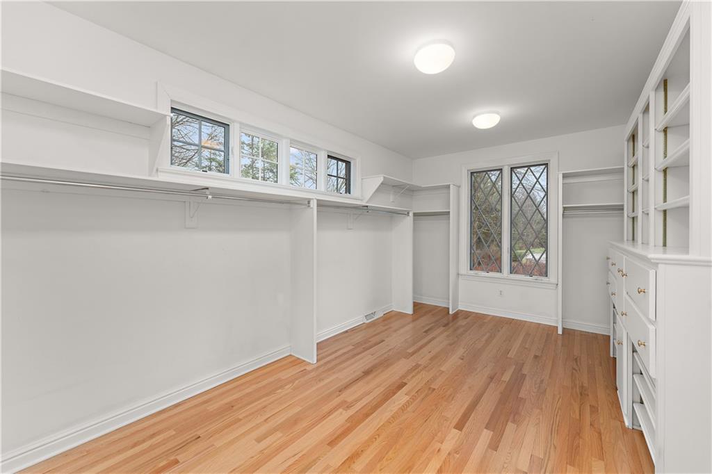 7 Meadowood Drive Pittsburgh, PA 15215 - Photo 16 of 45 a view of empty room with wooden floor and fan