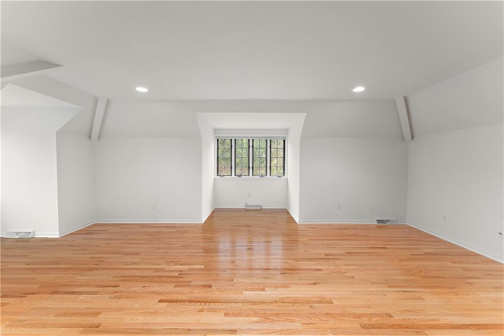 7 Meadowood Drive Pittsburgh, PA 15215 - Photo 24 of 45 a view of empty room with wooden floor and fan