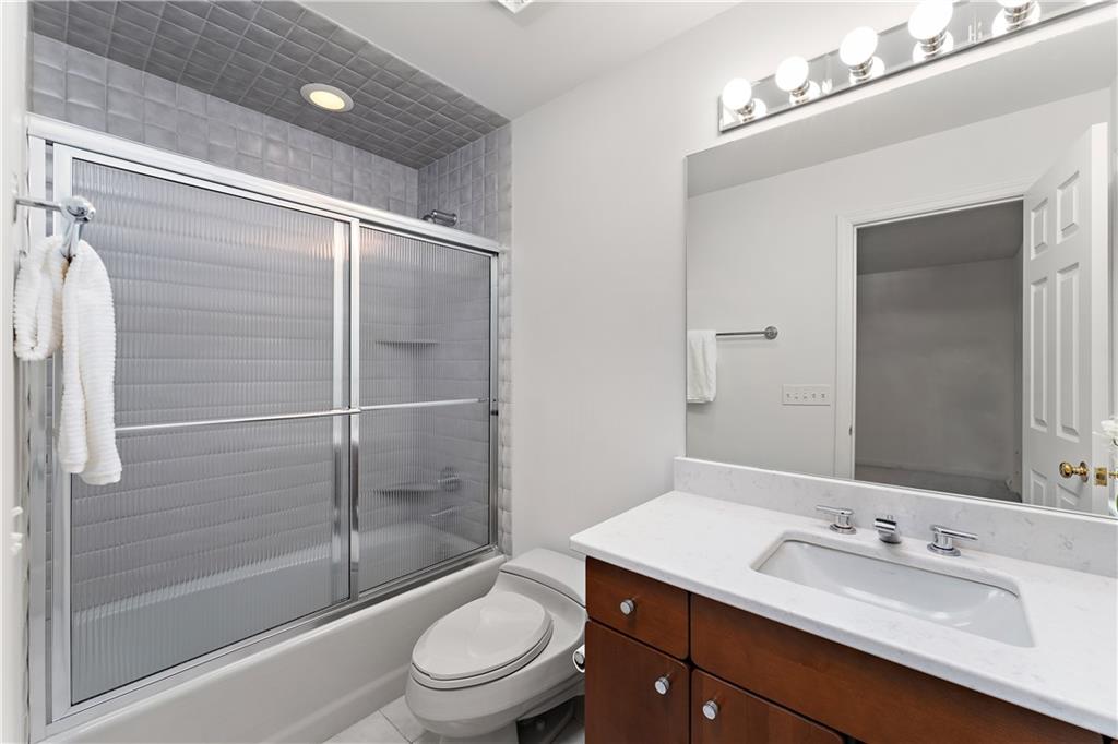 7 Meadowood Drive Pittsburgh, PA 15215 - Photo 28 of 45 a bathroom with a sink a toilet and shower