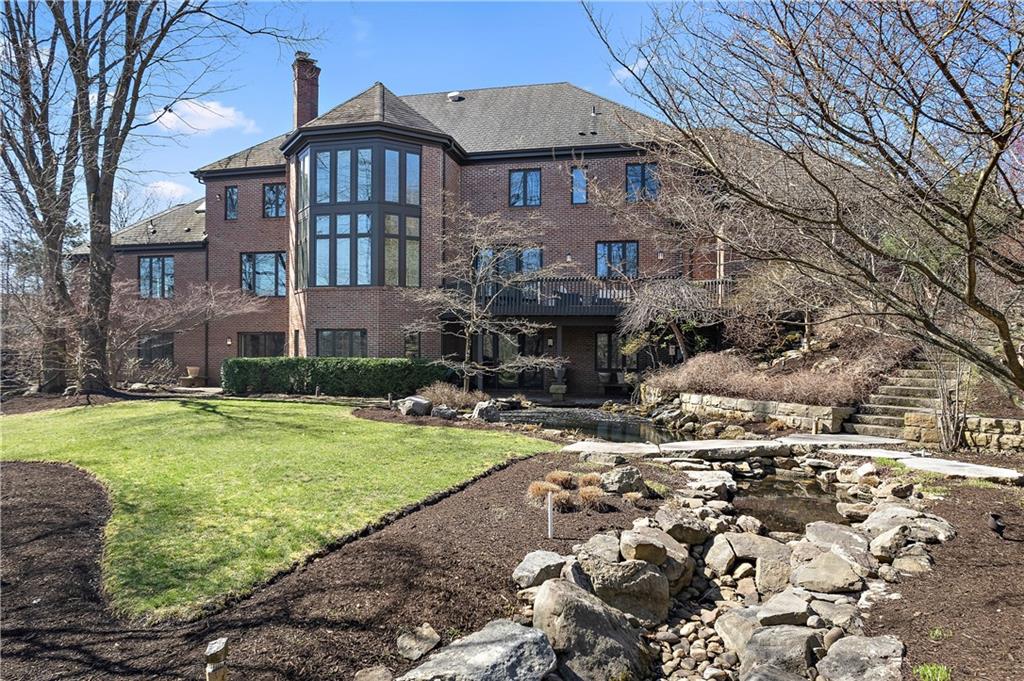 7 Meadowood Drive Pittsburgh, PA 15215 - Photo 35 of 45 a front view of a house with a yard