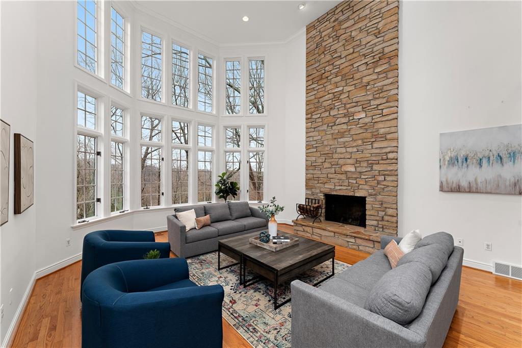 7 Meadowood Drive Pittsburgh, PA 15215 - Photo 4 of 45 a living room with furniture a rug and a fireplace