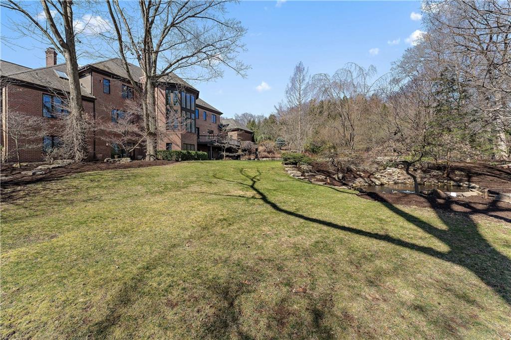 7 Meadowood Drive Pittsburgh, PA 15215 - Photo 42 of 45 a view of a yard with brick wall