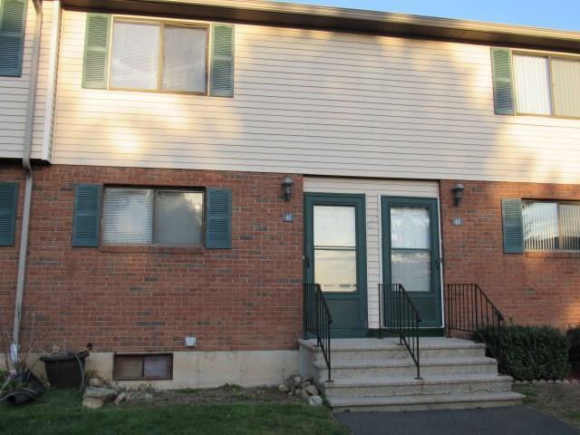 39 Horton Hill Road, Unit 4I Naugatuck, CT 06770 - Photo 1 of 1 a view of front door of house with yard
