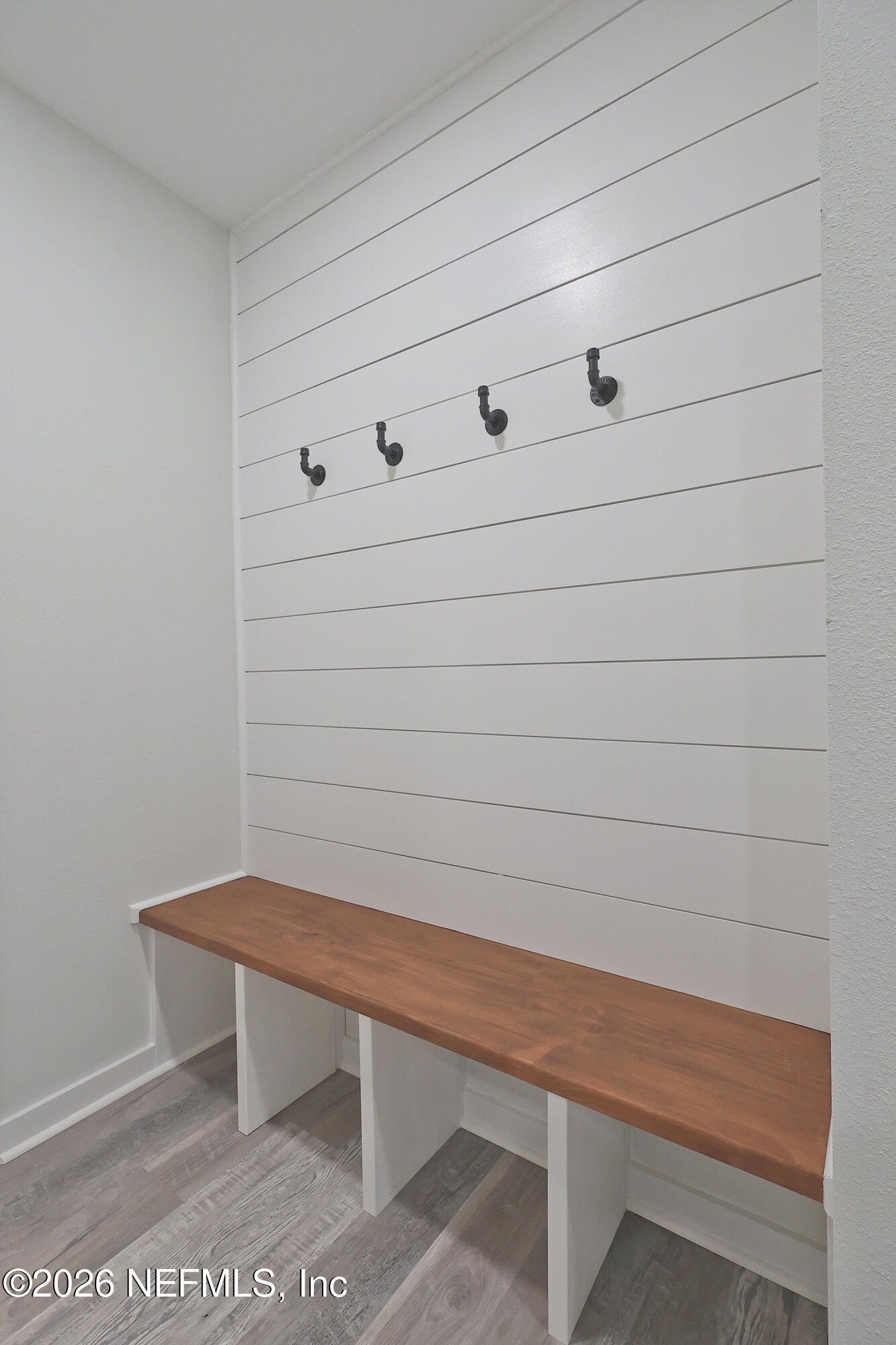 30 Delmonte Street Baldwin, FL 32234 - Photo 6 of 37 a view of a bench and cabinet