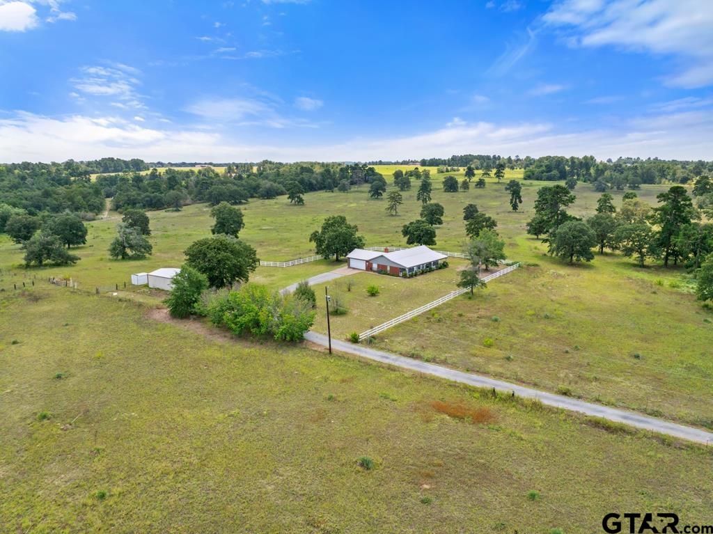 14762 County Road 3147 Tyler, TX 75706 - Photo 1 of 48 a view of a lake with houses in the background