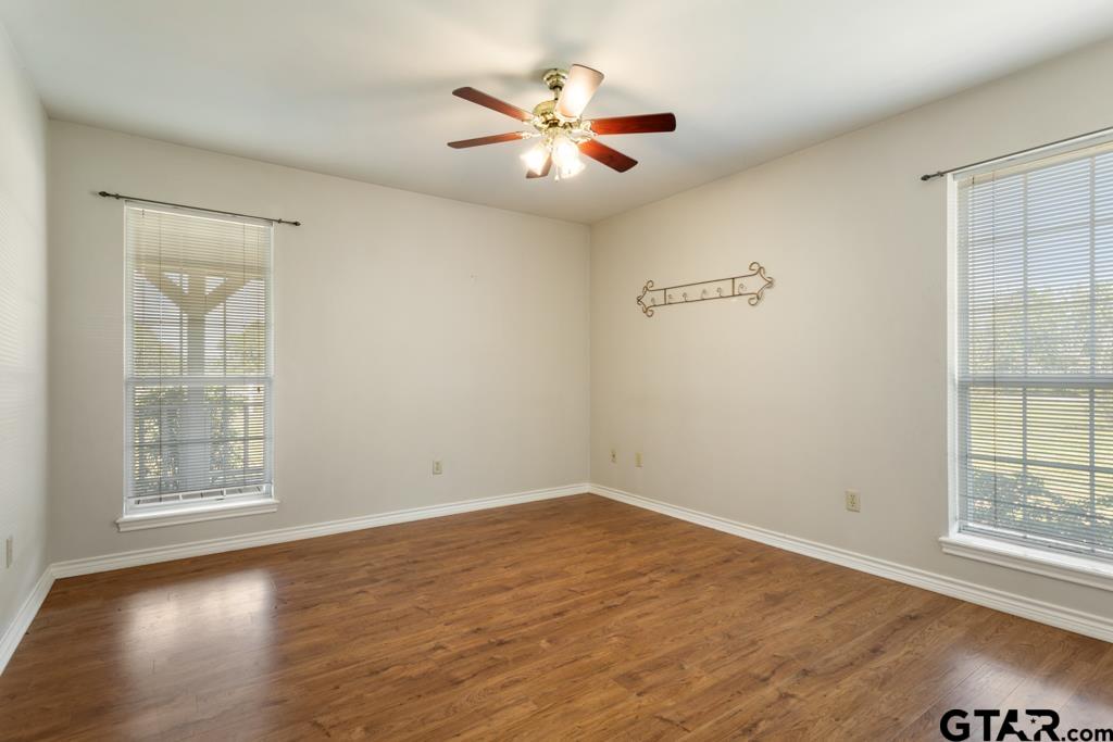 14762 County Road 3147 Tyler, TX 75706 - Photo 17 of 48 wooden floor in an empty room with a window