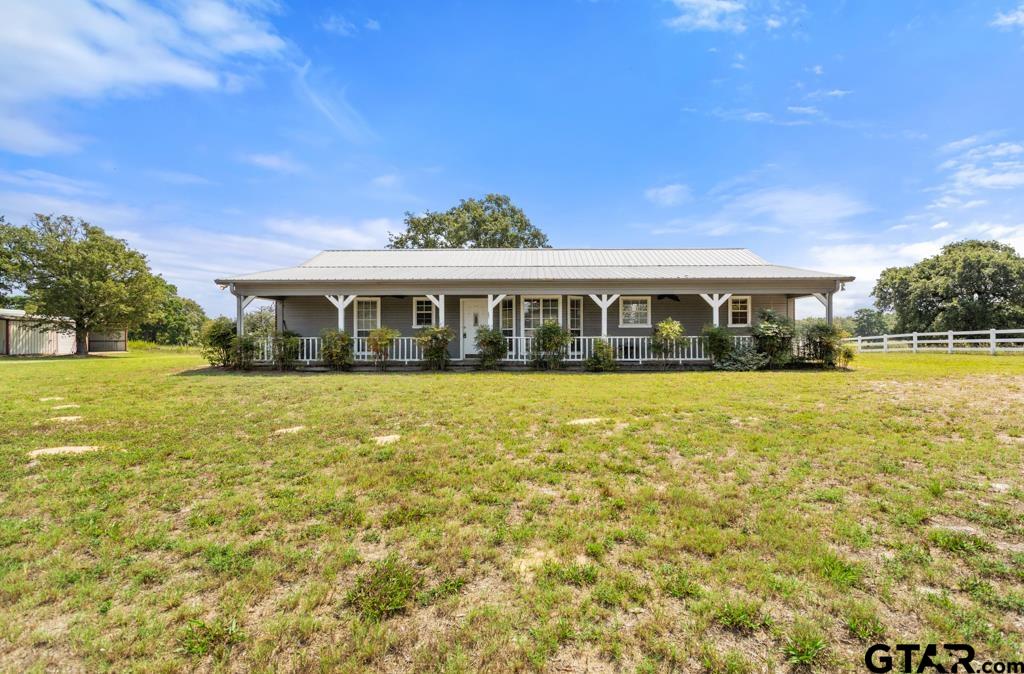 14762 County Road 3147 Tyler, TX 75706 - Photo 3 of 48 a view of a house with a swimming pool