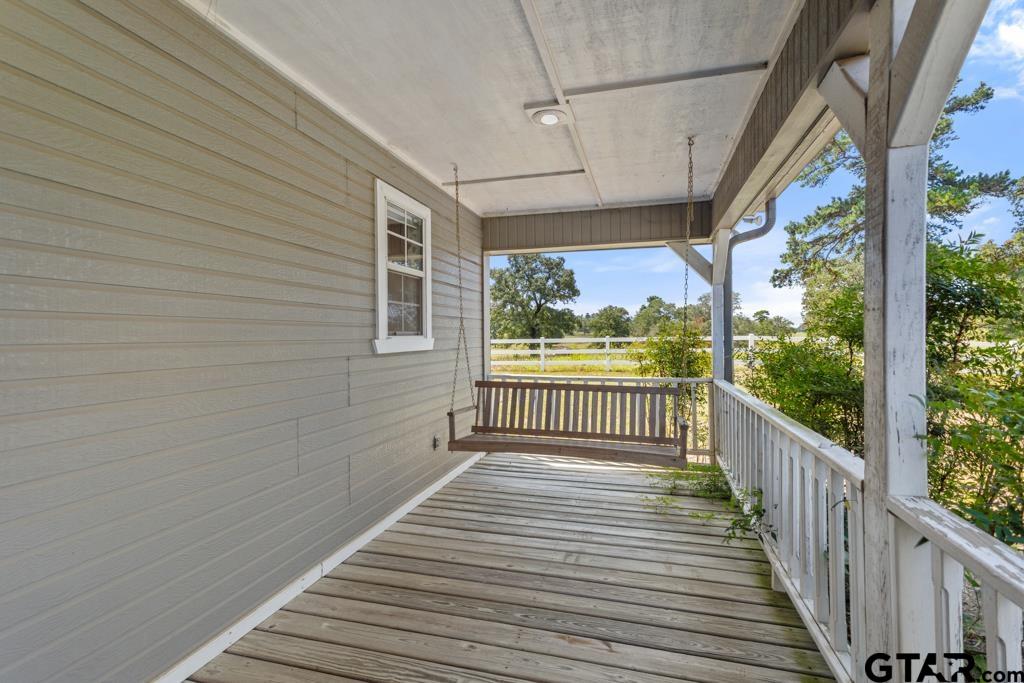 14762 County Road 3147 Tyler, TX 75706 - Photo 32 of 48 a view of a balcony with wooden floor