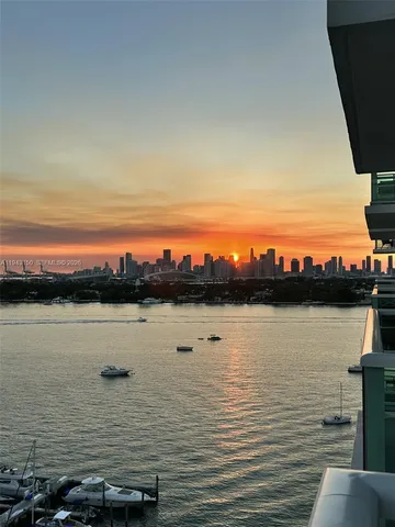 a view of a lake from a city