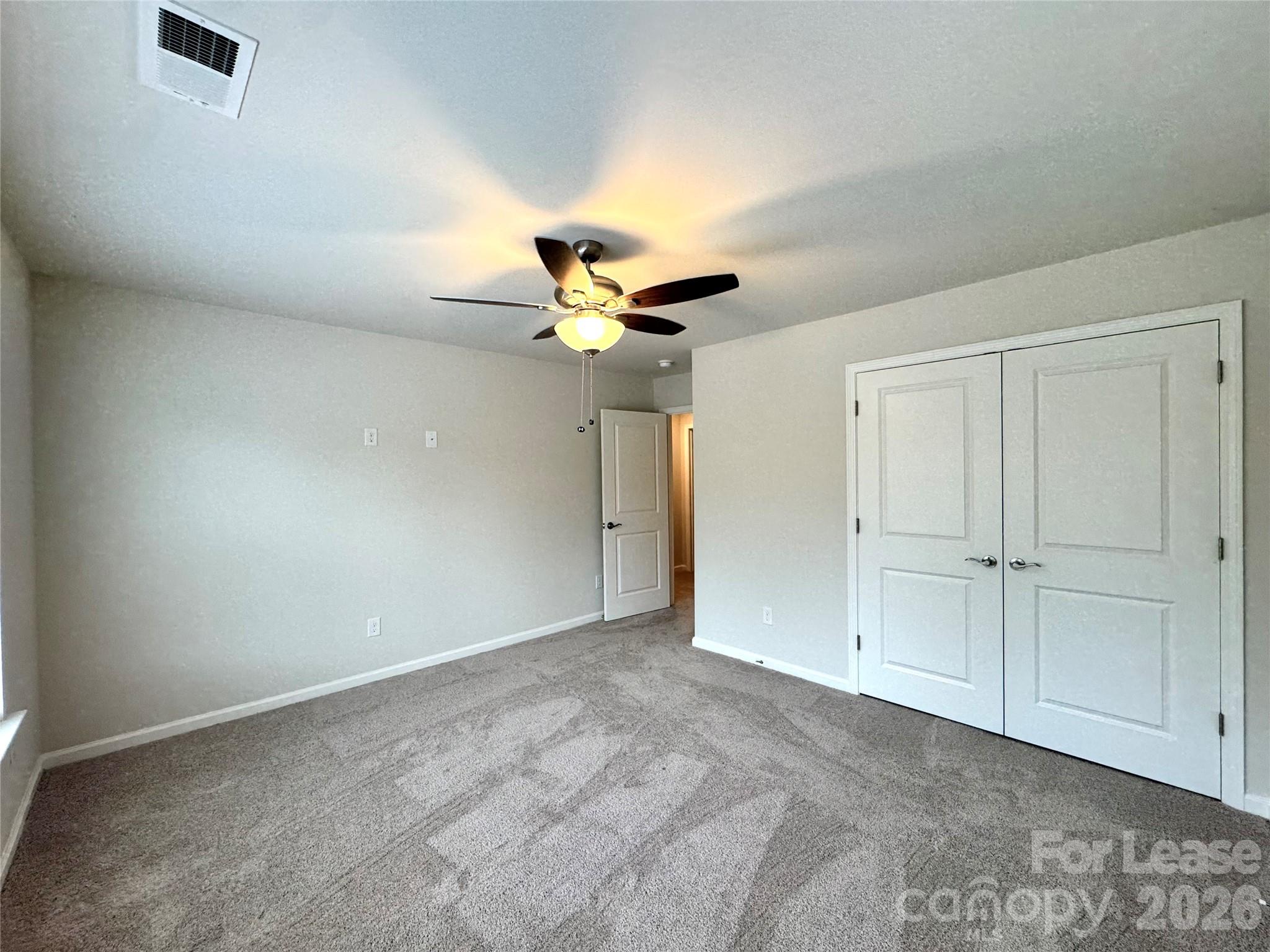 4700 Prosperity Church Road, Unit 6409 Charlotte, NC 28269 - Photo 16 of 23 a view of an empty room