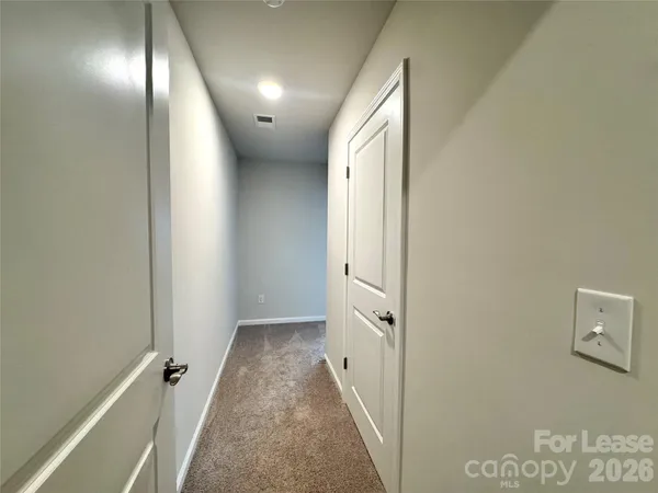 an entryway with a hallway