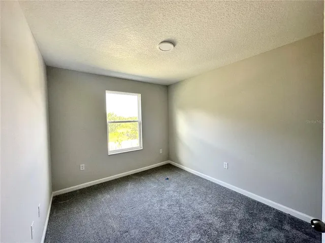 an empty room with window