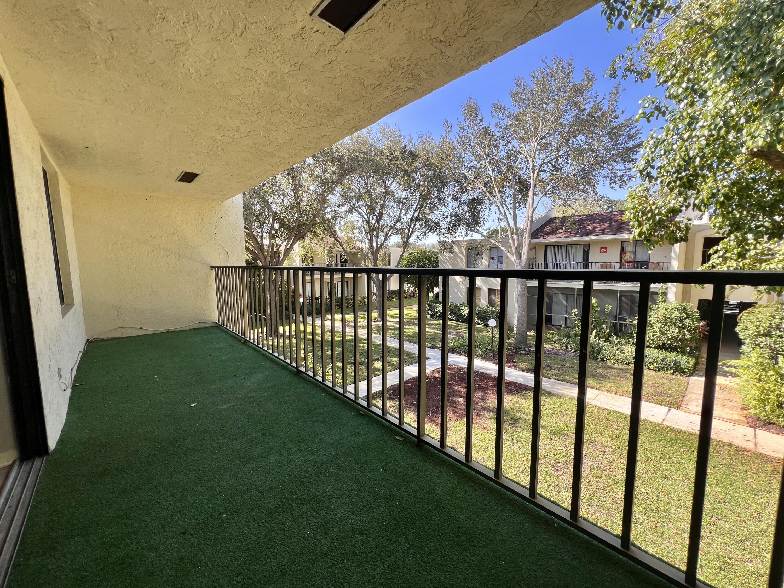 150 Pineview Road, Unit J5 Jupiter, FL 33469 - Photo 21 of 35 a view of a porch