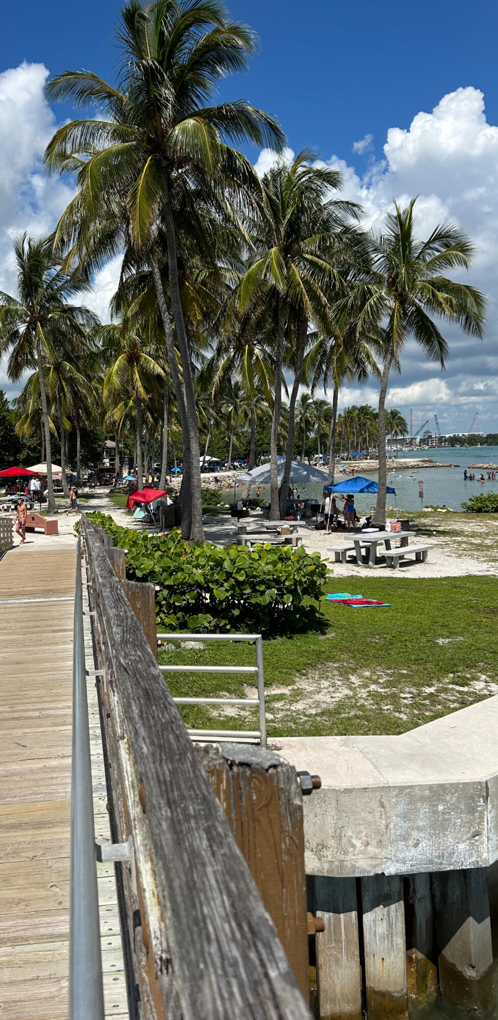 150 Pineview Road, Unit J5 Jupiter, FL 33469 - Photo 34 of 35 a view of a swimming pool with an outdoor space and seating area