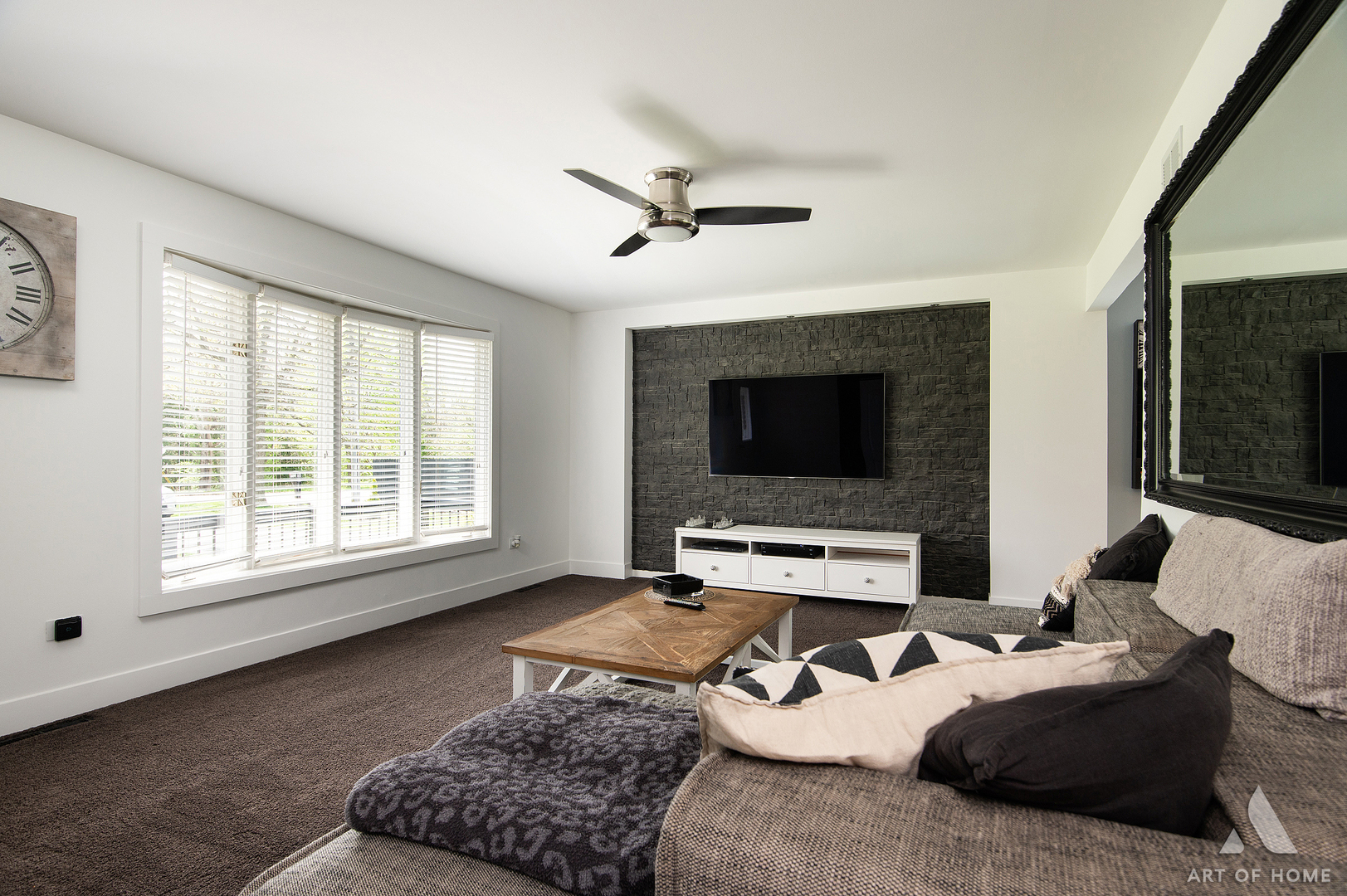 15529 129th Street Lemont, IL 60439 - Photo 12 of 65 a living room with furniture ceiling fan and a fireplace