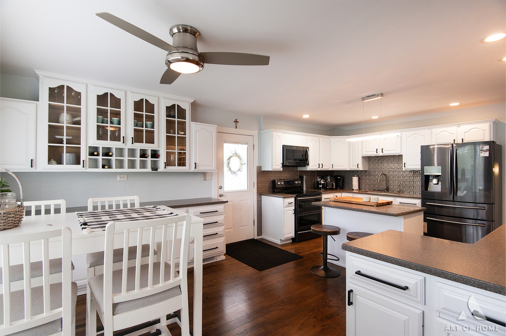 15529 129th Street Lemont, IL 60439 - Photo 15 of 65 a kitchen with stainless steel appliances kitchen island granite countertop a refrigerator and cabinets