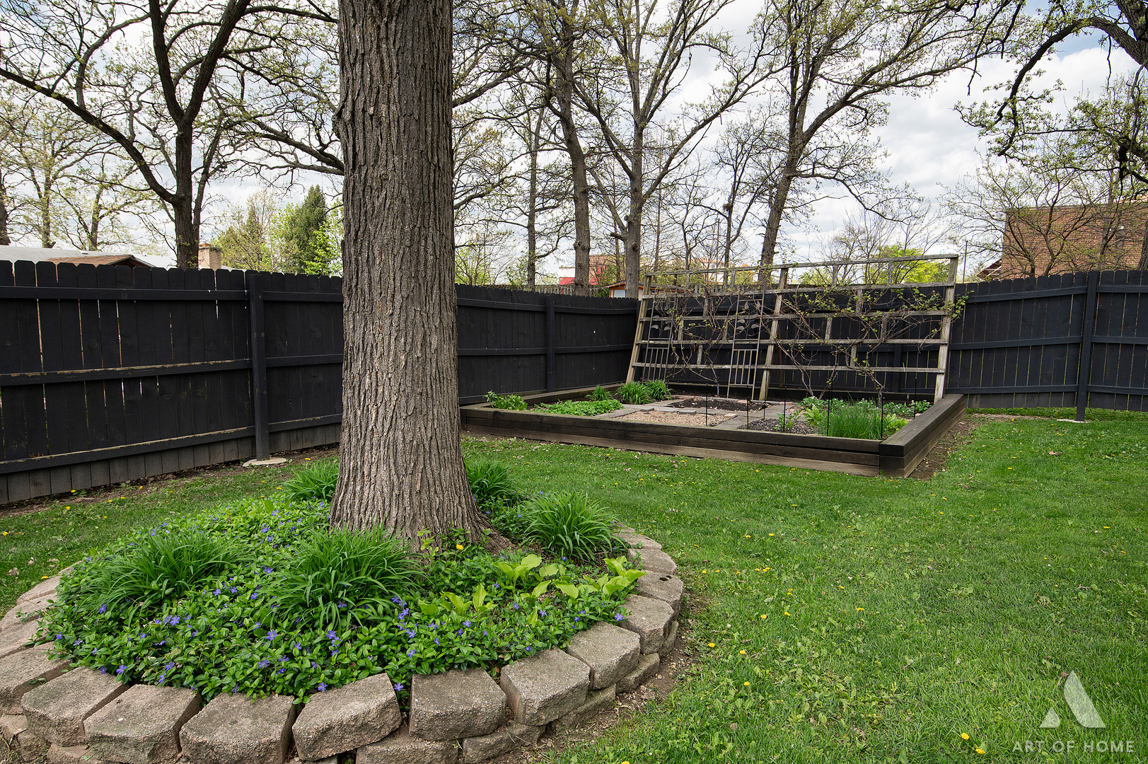 15529 129th Street Lemont, IL 60439 - Photo 44 of 65 a view of a backyard with wooden fence and large trees