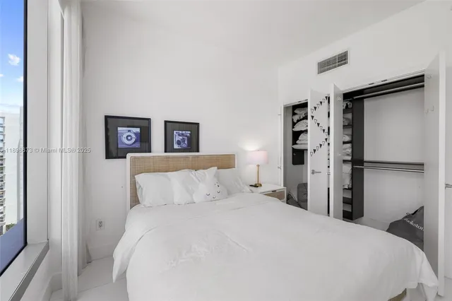 a view of a storage & utility room with washer and dryer