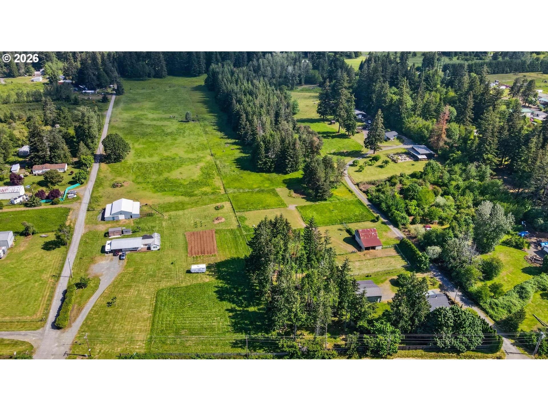 33951 Southeast Coupland Road Estacada, OR 97023 - Photo 44 of 48 a picture of houses with outdoor space