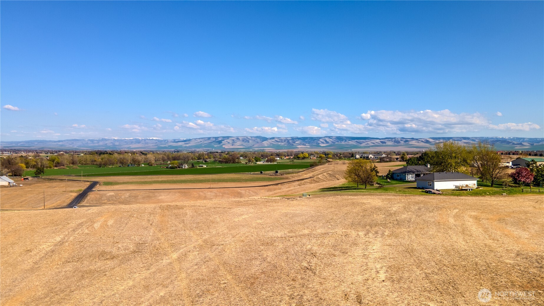 a view of a city & an ocean view