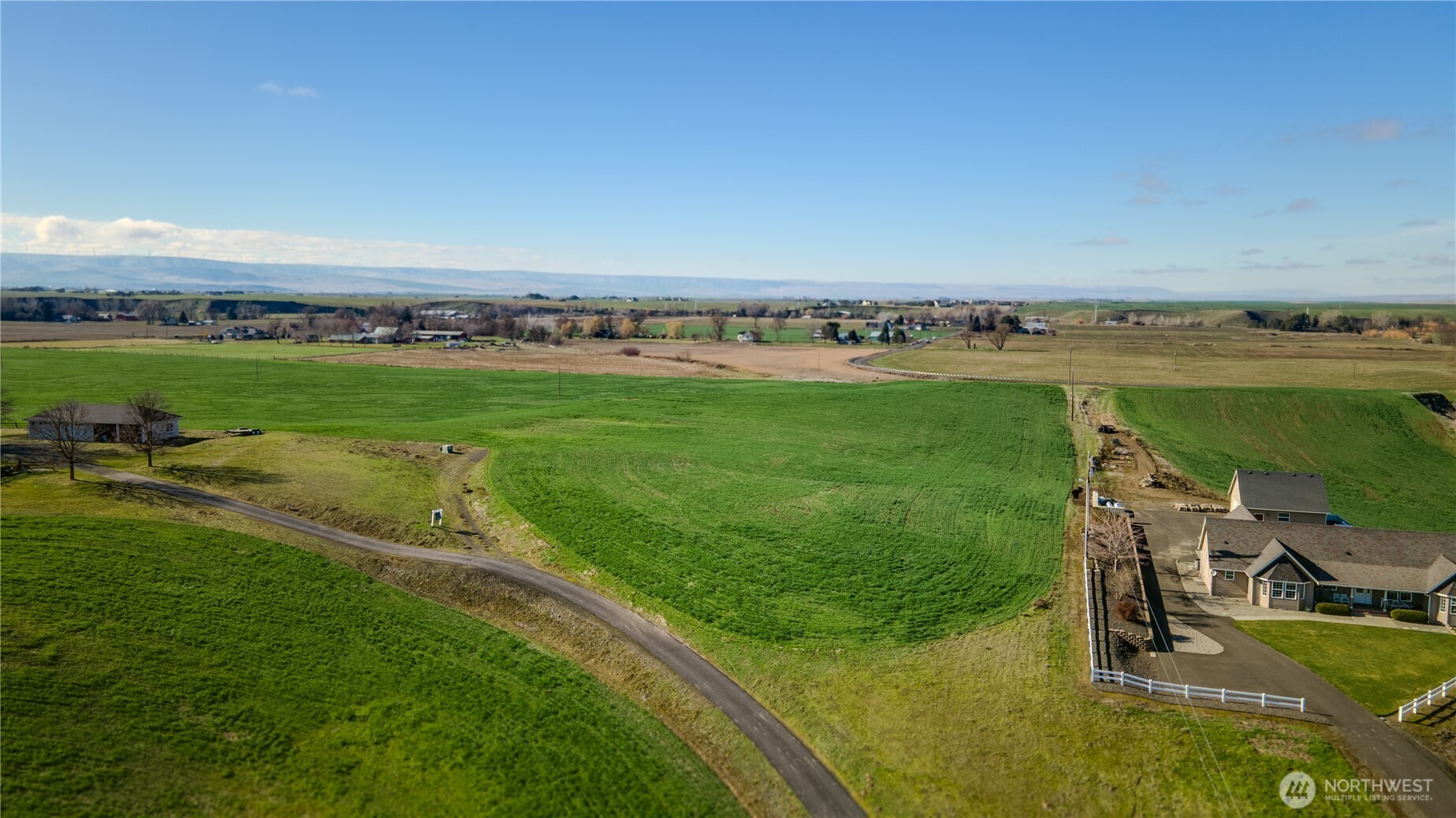 187 Cross Creek Road Walla Walla, WA 99362 - Photo 15 of 22 a view of a lake with a big yard