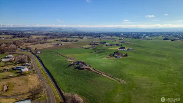 an aerial view of a golf course with a yard