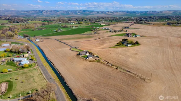 an aerial view of a house with a garden