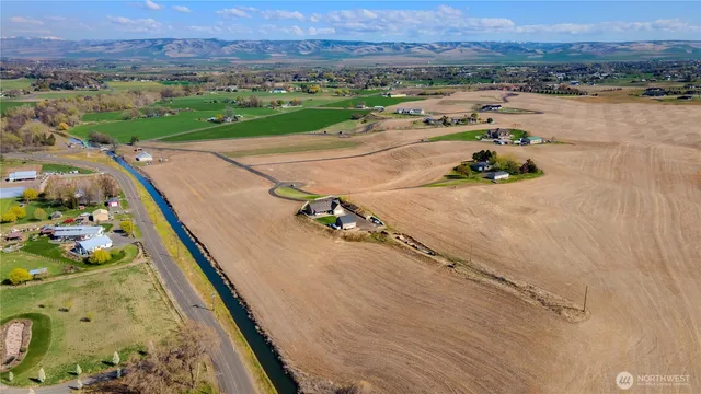 an aerial view of a house with a garden